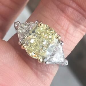 3.7 Carat TW Fancy Light Yellow Oval Diamond Engagement Ring With Half Moons GIA