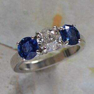 Diamond and Sapphire 3 stone engagement Ring Set in Platinum
