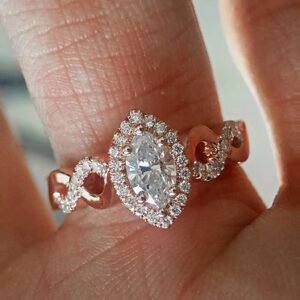 Marquise Diamond Halo Engagement Ring Set In Rose Gold and Diamonds Twist Shank