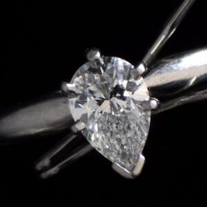 0.61 Carat Pear Shape F Color VVS2 Solitaire Engagement Ring Set In Platinum