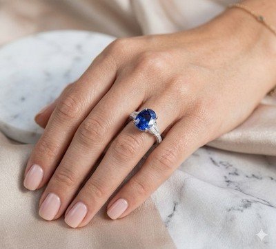Stunning Blue Sapphire Oval Three Stone Ring with Tapered Baguette Diamonds - Image 2