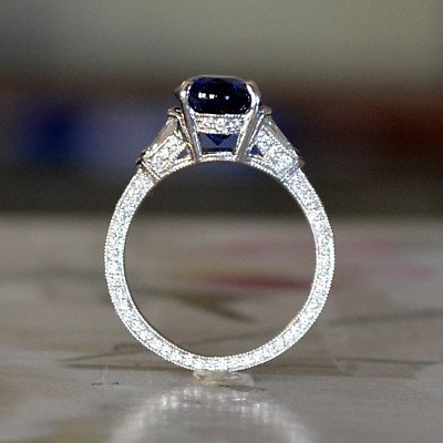 Stunning Blue Sapphire Oval Three Stone Ring with Tapered Baguette Diamonds - Image 4